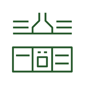 Fully equipped kitchen and dining area at La Cancela Verde with traditional features, modern appliances, and space for six guests.