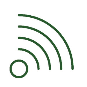 Spacious living room at La Cancela Verde with comfortable seating, satellite TV, and views of the garden terrace.